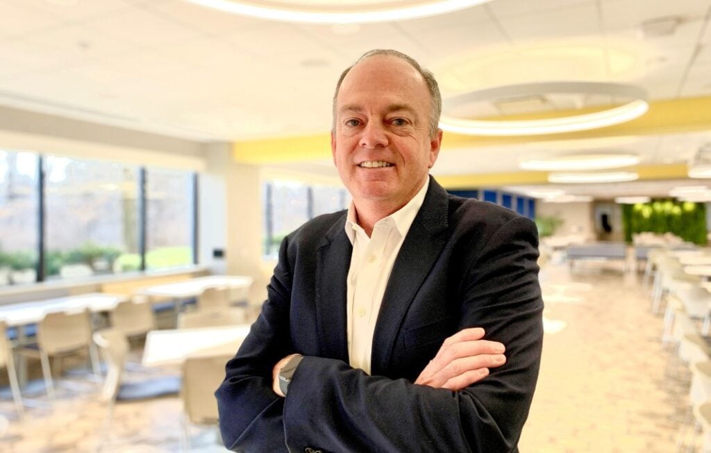 headshot of John Schwab, CFO at Vertex