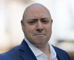 headshot of Andrew Coccia, Deloitte