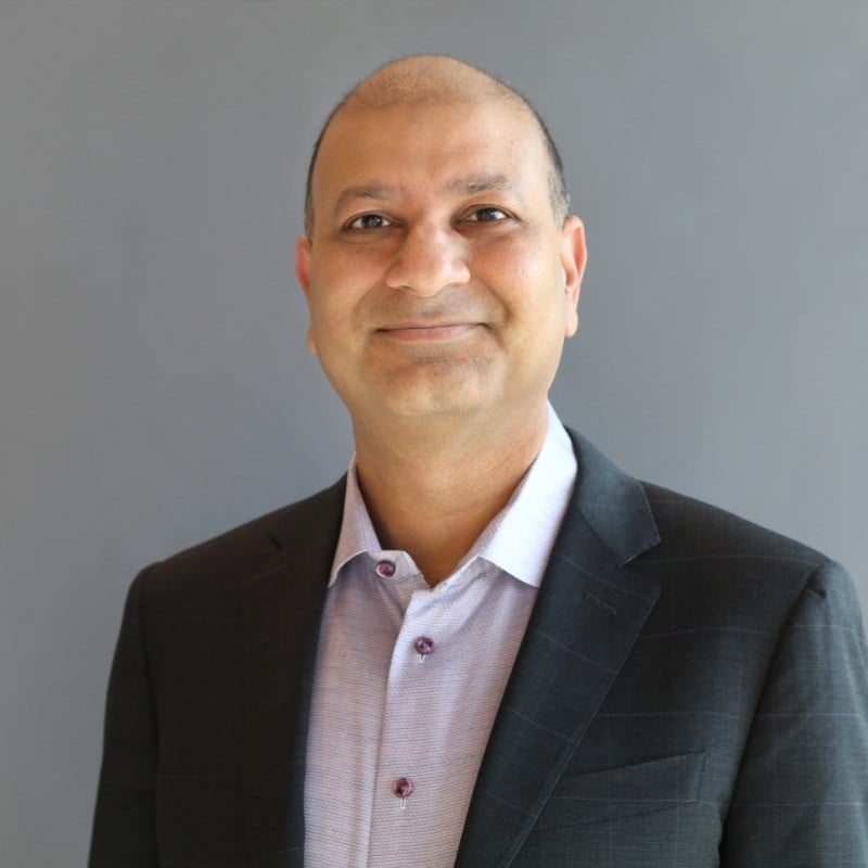 headshot of Kam Agarwalla