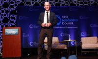 Oakland McCulloch on stage at the CFO Leadershp Conference