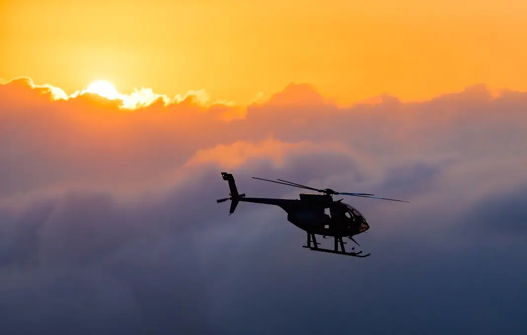 Hawaiian helicopter flying toward Killauea crater