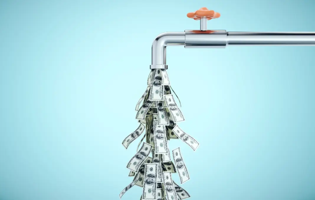 Faucet with dollar bills